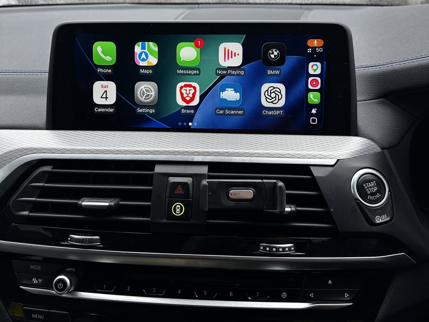 Apple CarPlay running on a BMW iDrive screen, activated by Apex Coding in Sittingbourne